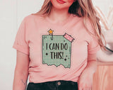 "I Can Do This" design on a peach unisex t-shirt