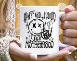 "Ain't No Hood Like Motherhood 2024" design on a white ceramic coffee mug