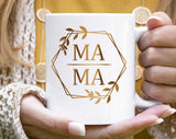 "Mama Gold Flower" design on a white ceramic coffee mug
