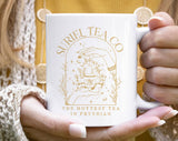 "Suriel Tea Co Court Of Thorns Inspired" design on a white ceramic coffee mug