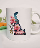 "Delaware State Flower Peach Blossom" design on a white ceramic coffee mug