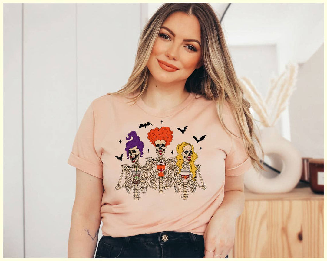 "Sanderson Coffee Skeletons" design on a peach unisex t-shirt