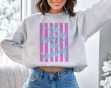 "The Heavens Are Roaring Faith Jesus" design on an ash gray unisex crewneck sweatshirt