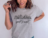 "Booktrovert Bookshelf" design on a heather gray unisex t-shirt