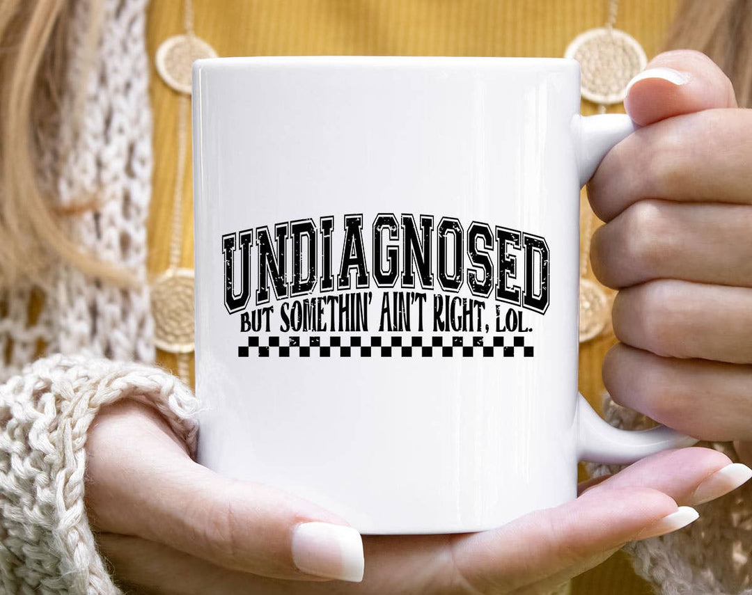 "Undiagnosed, But Something Ain't Right" design on a white ceramic coffee mug