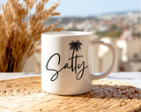 "Salty" design on a white ceramic coffee mug