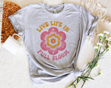 "Live Life In Full Bloom" design on a heather gray unisex t-shirt