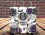 "Spooky Vibes Coffee" design on a 20 oz skinny tumbler with lid and straw