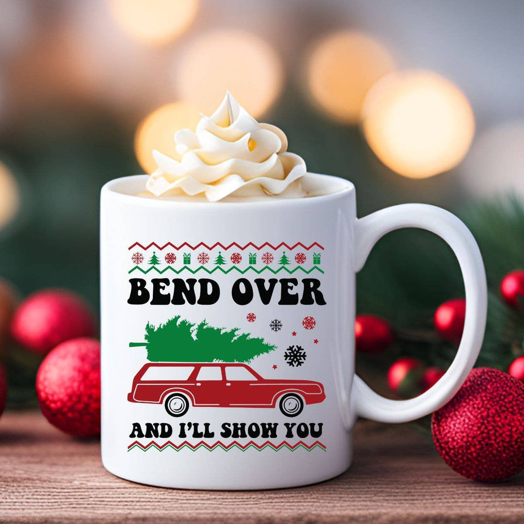 "Bend Over and I'll Show You" Christmas design on a white coffee mug