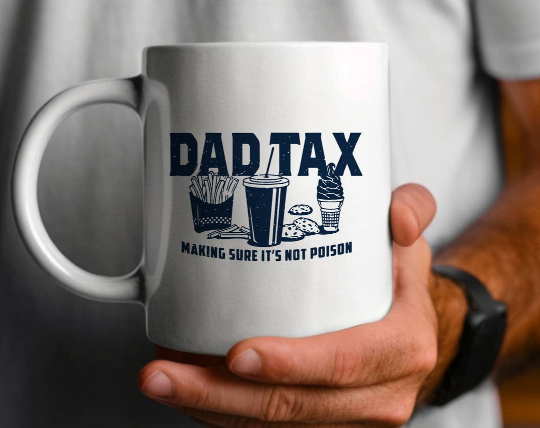 "Dad Tax" design on a white ceramic coffee mug