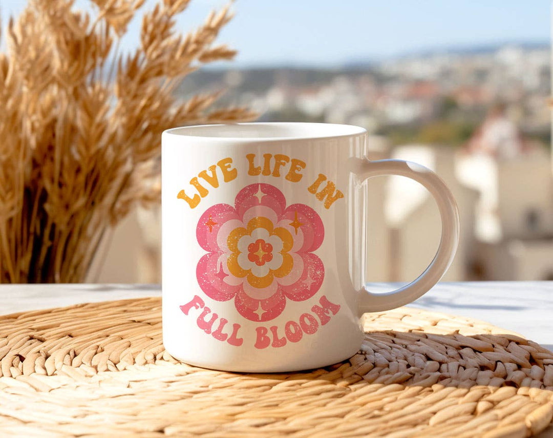 "Live Life In Full Bloom" design on a white ceramic coffee mug
