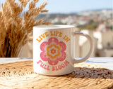 "Live Life In Full Bloom" design on a white ceramic coffee mug