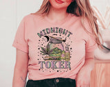 "Midnight Toker Hippie" design on a peach unisex t-shirt