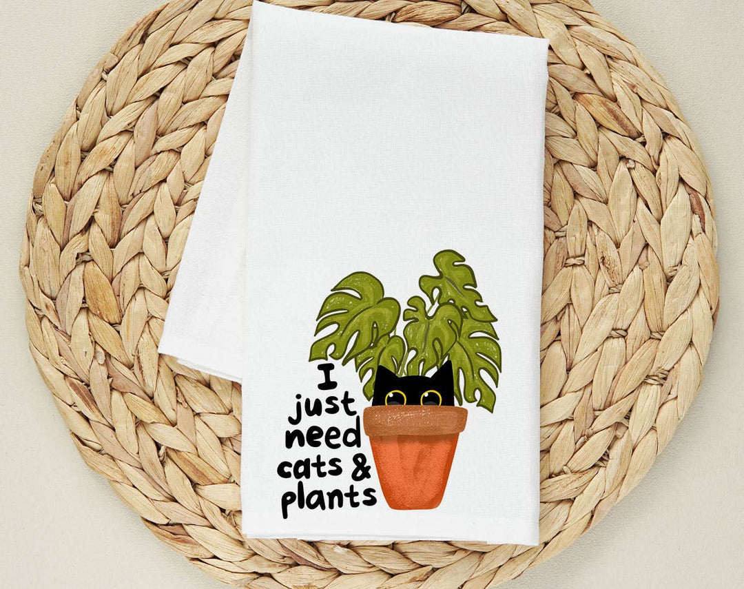 "I Just Need Cats And Plants" design on a white 28 x 28 inch flour sack tea towel