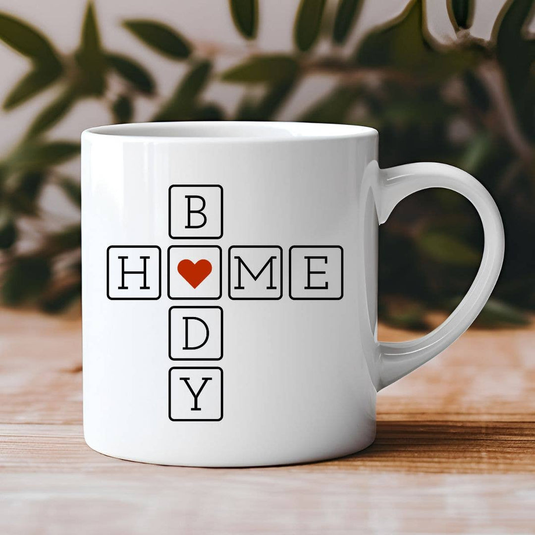 "Home Body Heart Introvert Cozy" design on a white ceramic coffee mug
