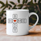"Home Body Heart Introvert Cozy" design on a white ceramic coffee mug