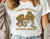 "Frog & Toad Ate Cookies" design on a white unisex t-shirt