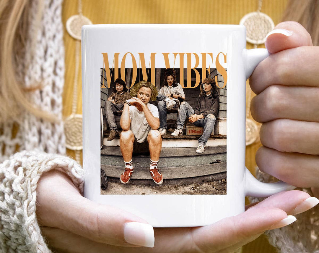 "Mom Vibes Punk" design on a white ceramic coffee mug