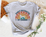 "Easily Distracted By Wieners" design on a heather gray unisex t-shirt