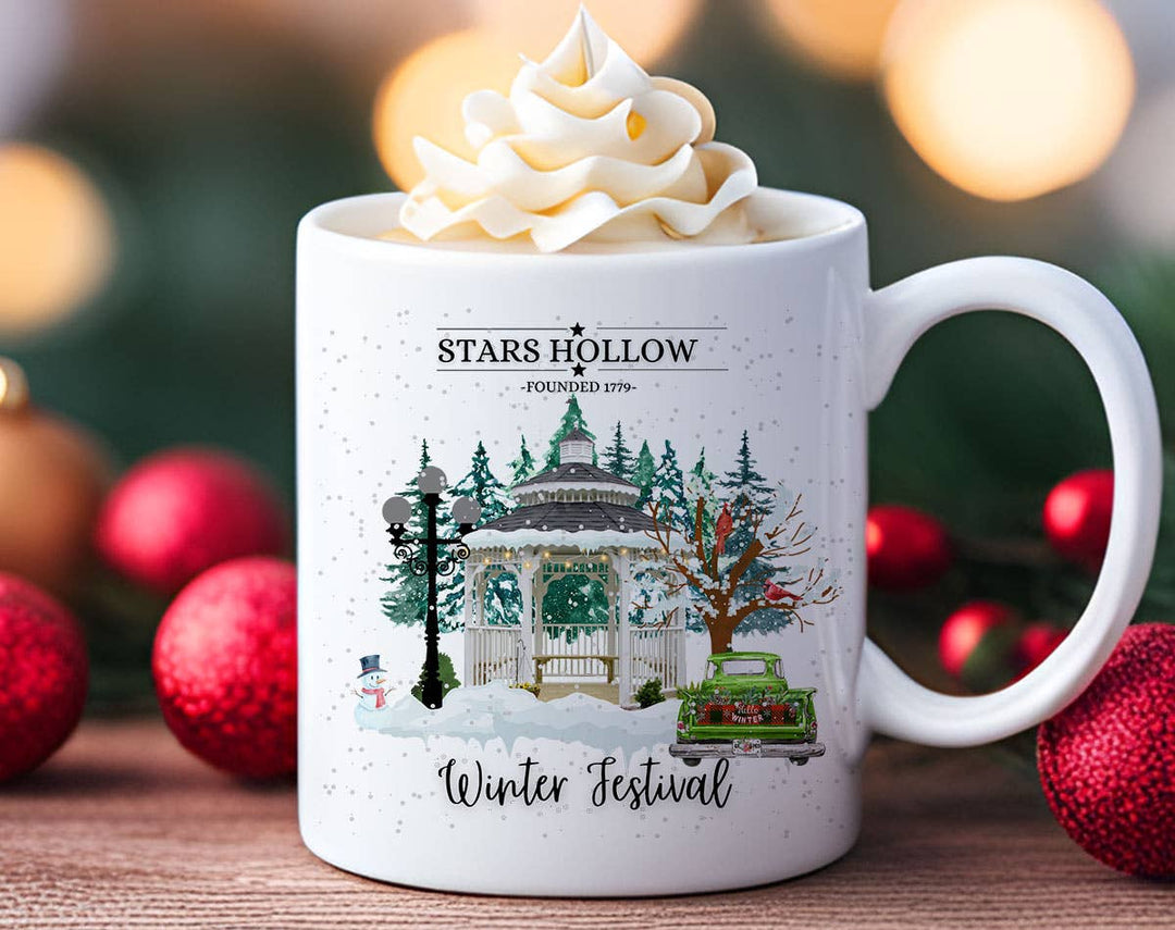 "Star Hollow Winter Fest" Christmas design on a white coffee mug