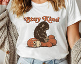 "Stay Kind Baby Punch Monkey" design on a white unisex t-shirt