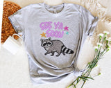 "See You Soon Raccoon" design on a heather gray unisex t-shirt