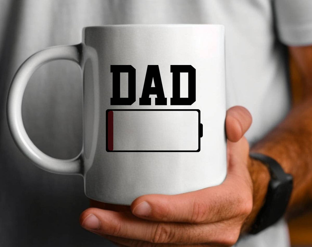 "Dad Battery Low" design on a white ceramic coffee mug