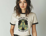 "Beam Me Up, This Place Sucks Alien" design on a natural ringer t-shirt with black contrast trim
