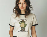 "If I Shenan It Once, I'll Shenanigan Frog" design on a natural ringer t-shirt with black contrast trim