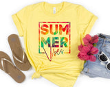 "Summer Vibes Tie Dye" design on a pale yellow unisex t-shirt