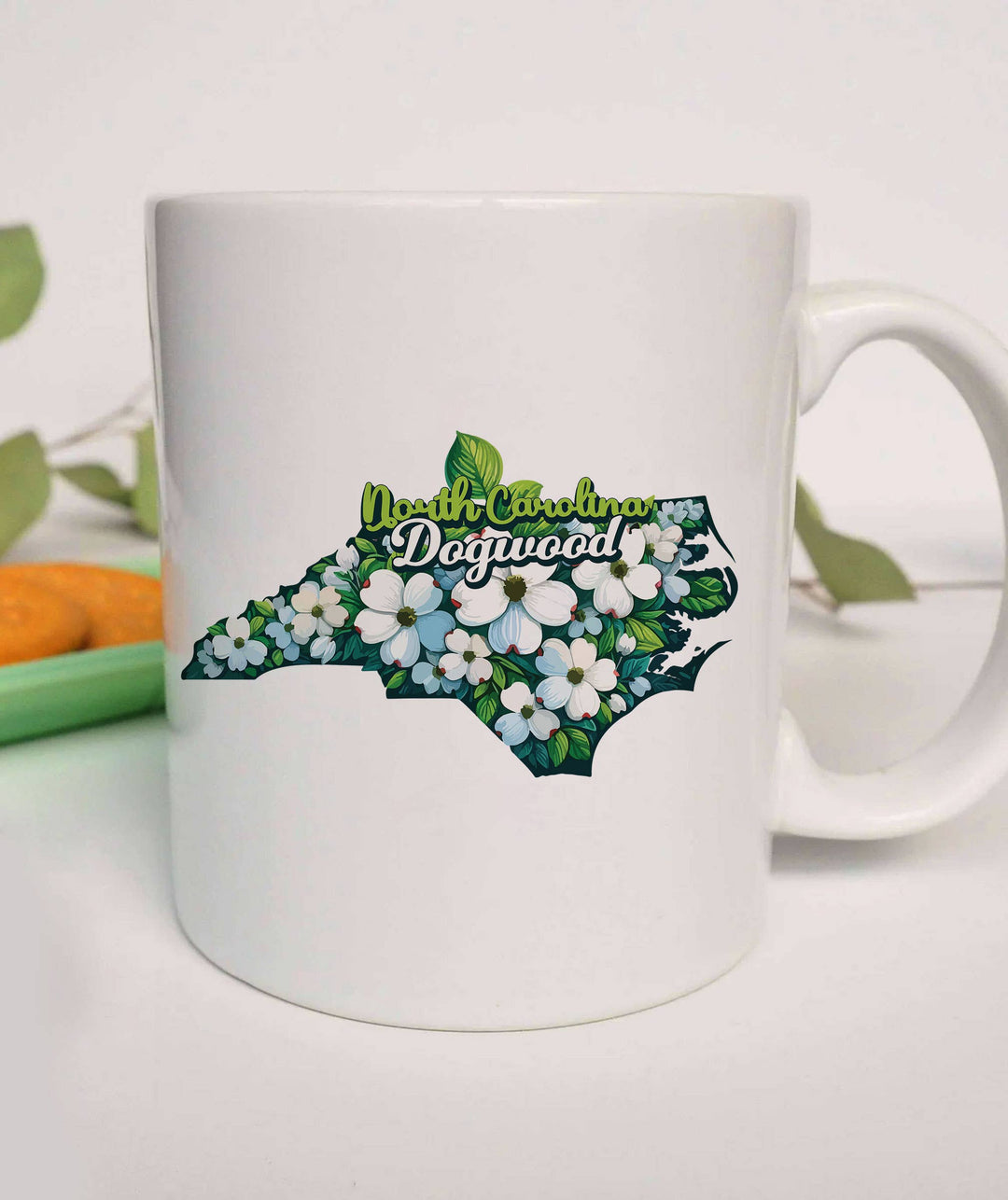 "North Carolina State Flower Dogwood" design on a white ceramic coffee mug
