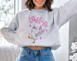 "Loose As A Goose Funny Animal" design on an ash gray unisex crewneck sweatshirt