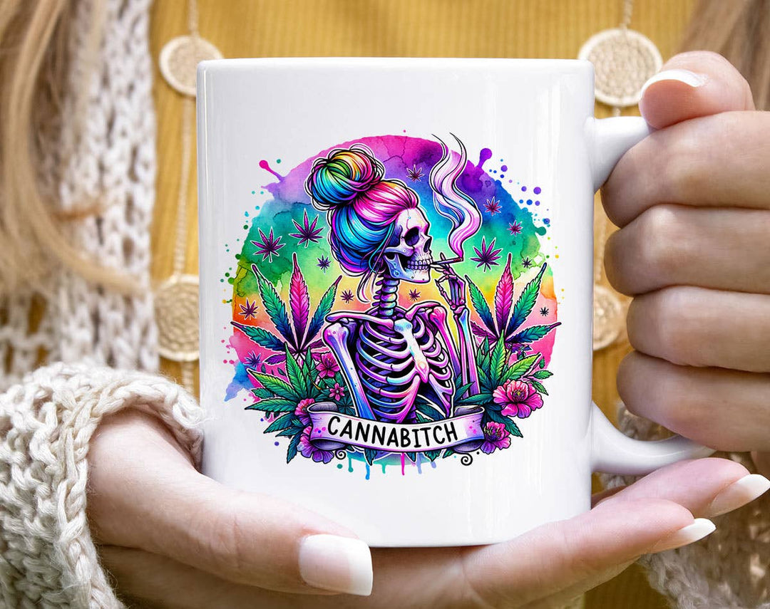 "Cannabitch Skeleton Hippie" design on a white ceramic coffee mug