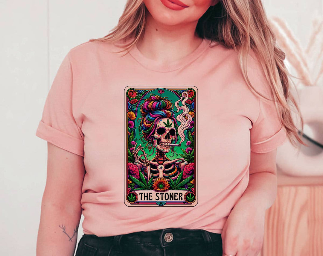 "The Stoner Tarot Skeleton" design on a peach unisex t-shirt