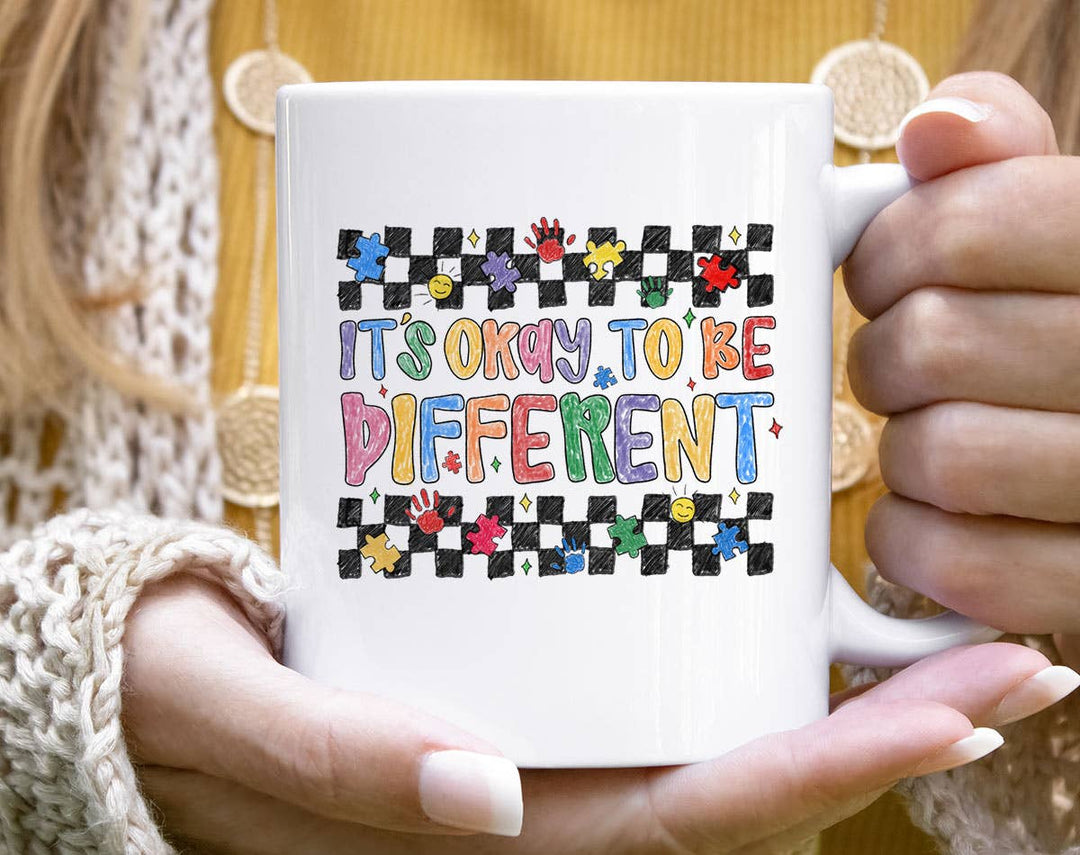 "It's Okay To be Different" design on a white ceramic coffee mug
