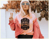 "The Black Flame Candle" design on a unisex t-shirt
