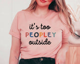 "It's Too Peopley Outside" design on a peach unisex t-shirt