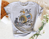 "Serotonin Booster Cats" design on a heather gray unisex t-shirt