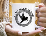 "Camp Half Blood" design on a white ceramic coffee mug