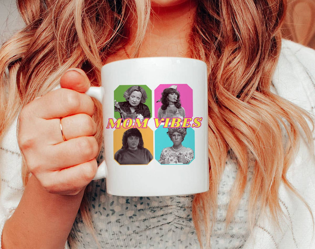 "Mom Vibes 90's" design on a white ceramic coffee mug