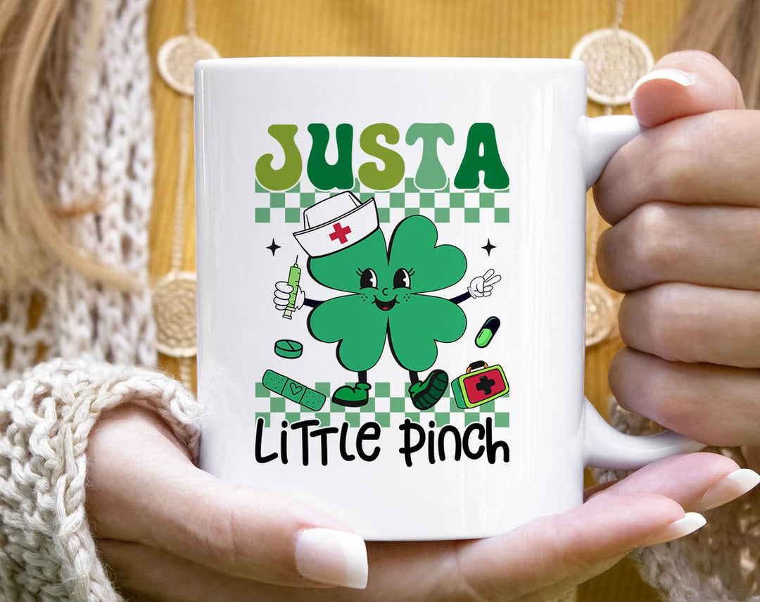 "Just A Little Pinch" design on a white ceramic coffee mug