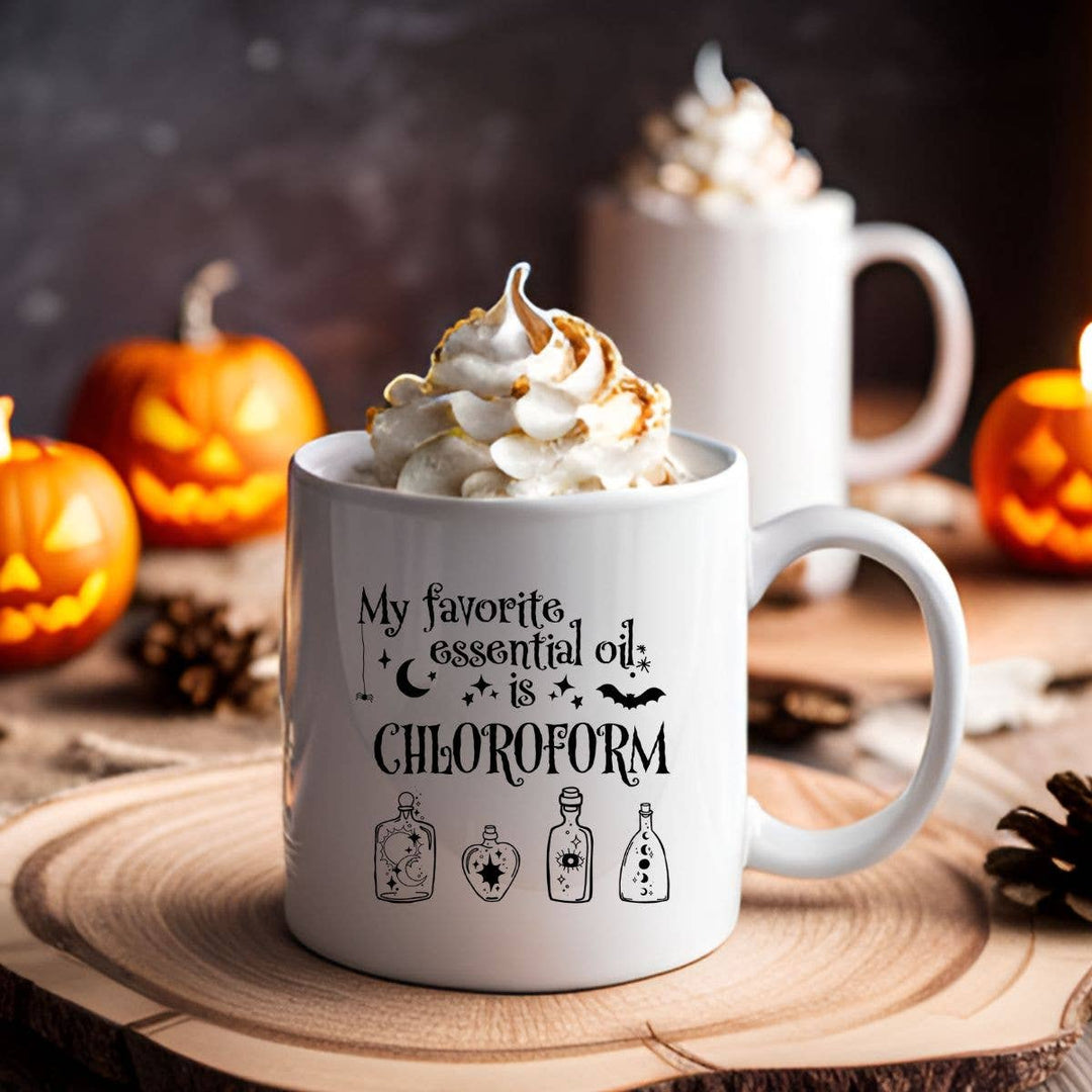 "My Favorite Essential Oil is Chloroform Dark" design on a white ceramic coffee mug
