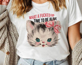 "What A F*cked Time To Be Alive Kitten" design on a white unisex t-shirt