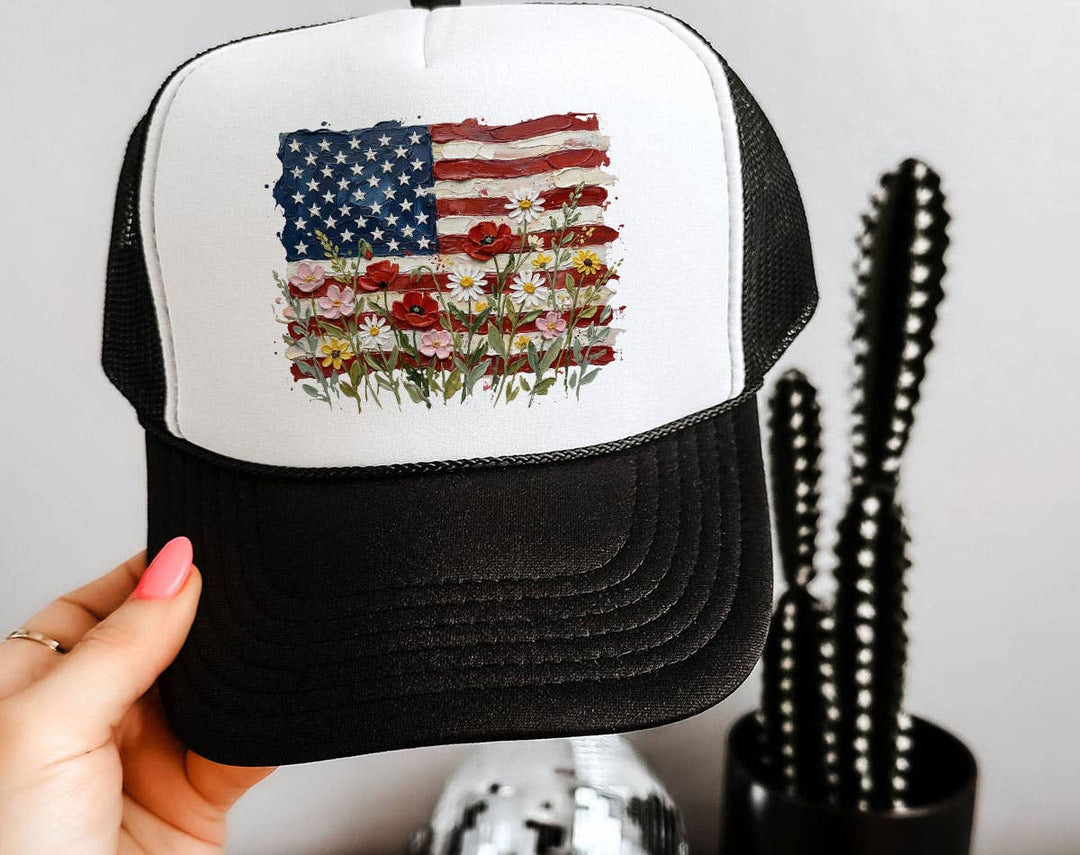 "American Flag Floral Painting" design on a mesh-back snapback trucker hat