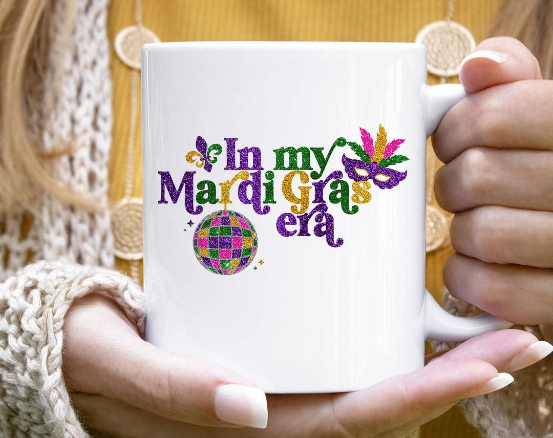 "In My Mardi Gras Era" design on a white ceramic coffee mug