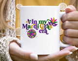"In My Mardi Gras Era" design on a white ceramic coffee mug