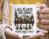 "All Plants Are Edible, Some Only Once" design on a white ceramic coffee mug