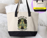 "Beam Me Up, This Place Sucks Funny Alien" design on a natural canvas zippered tote bag