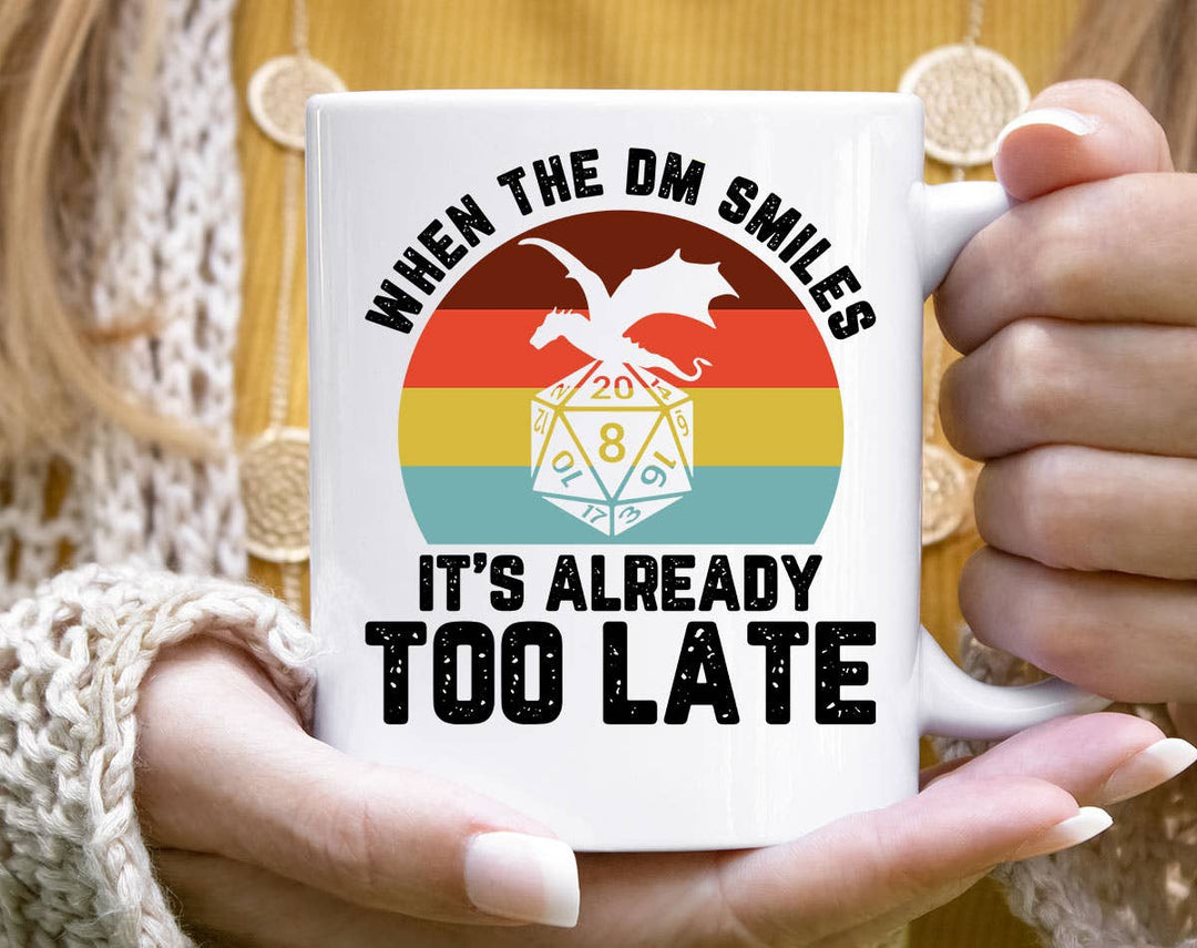 "When The DM Smiles" design on a white ceramic coffee mug