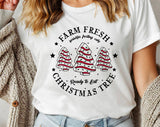 "Farm Fresh Christmas Tree Cakes" design on a white unisex t-shirt